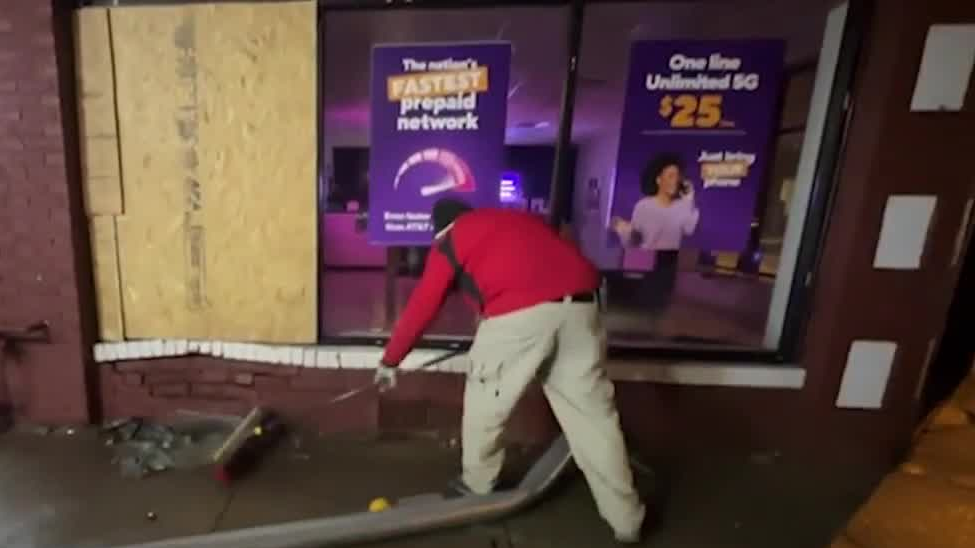 Westwood business cleaning up after car slams into building