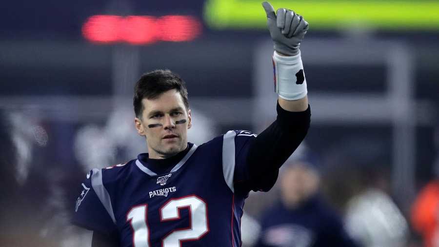 New England Patriots quarterback Tom Brady signals to a teammate before an NFL wild-card playoff football game against the Tennessee Titans, Saturday, Jan. 4, 2020, in Foxborough, Mass.