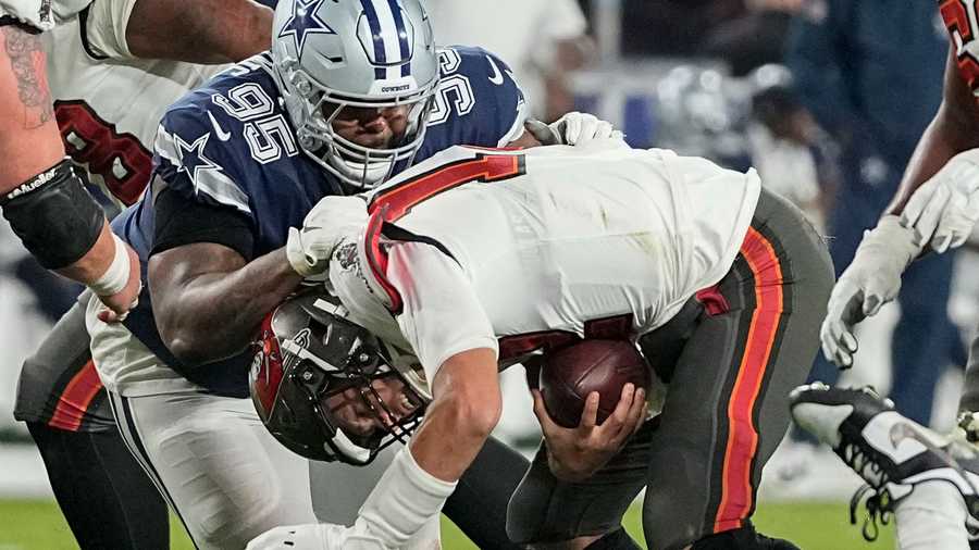 Cowboys end awkward playoff record by defeating Bucs in WC Game - CGTN