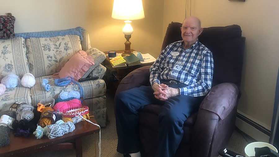 Tom Cornish, a 96-year-old World War II veteran, knits hats to donate to the Salvation Army.