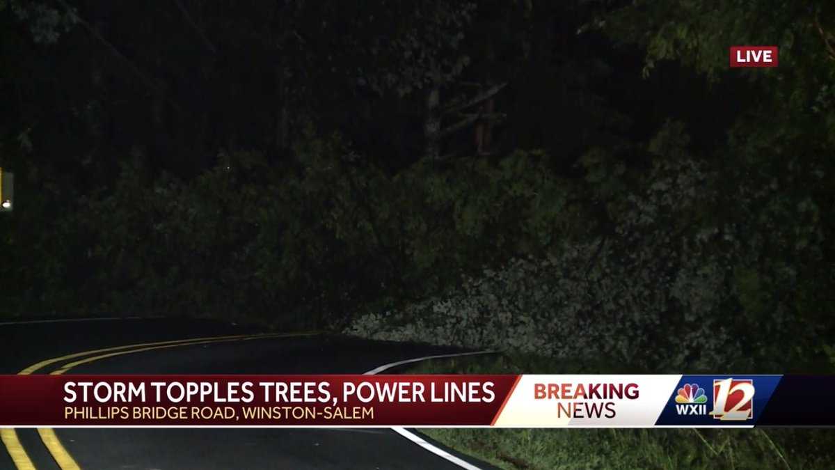Downed trees, toppled power lines close Winston-Salem road