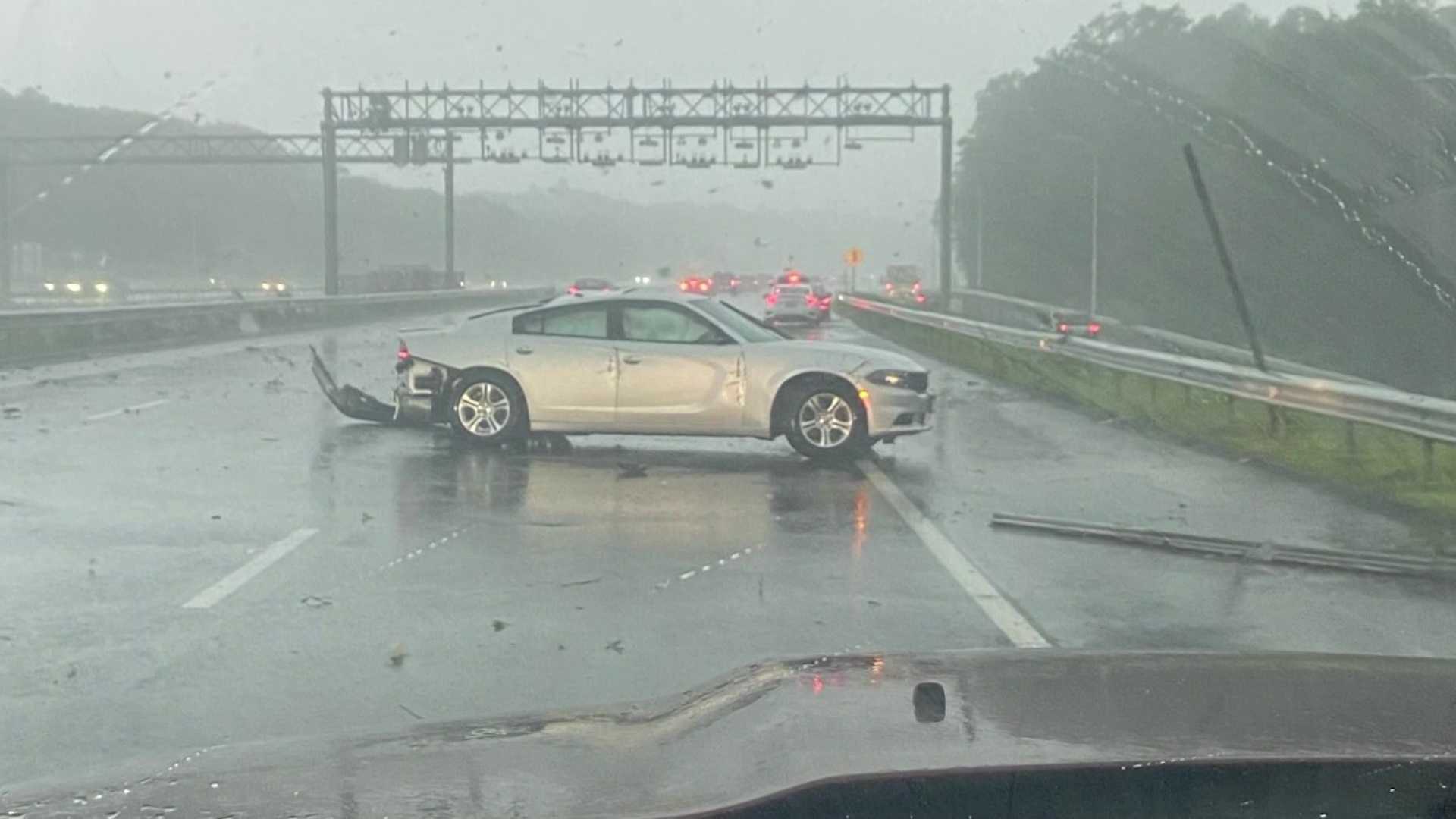 Driver hurt when suspected tornado picks up tosses car on highway