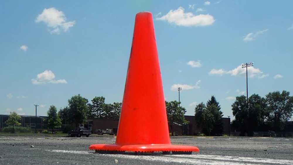 Worker setting out traffic cones killed in fall from truck