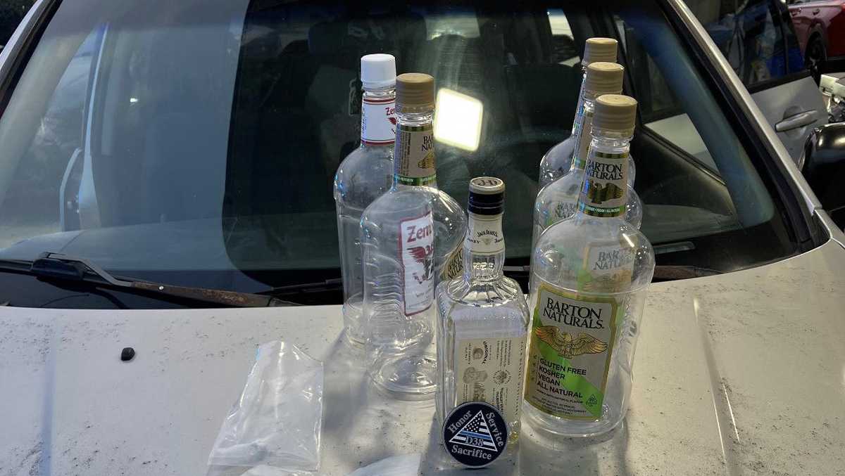 GCSO: Woman arrested after 6 open liquor bottles, drugs, stolen debit cards found in car