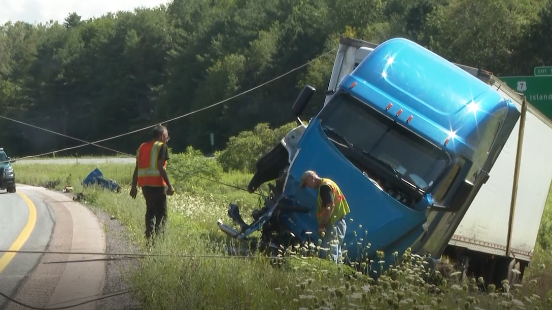 Tractor trailer rollover backs up traffic on I-89