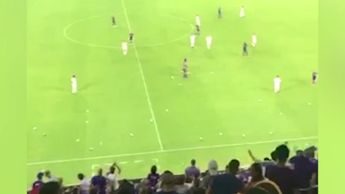 Orlando City fans throw trash onto field during game