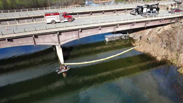 Stunning images: Box truck drives off bridge in Upper Valley, no injuries reported