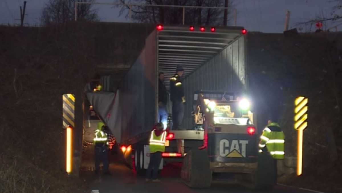 Road reopened after tractor trailer collides with bridge, dispatchers say
