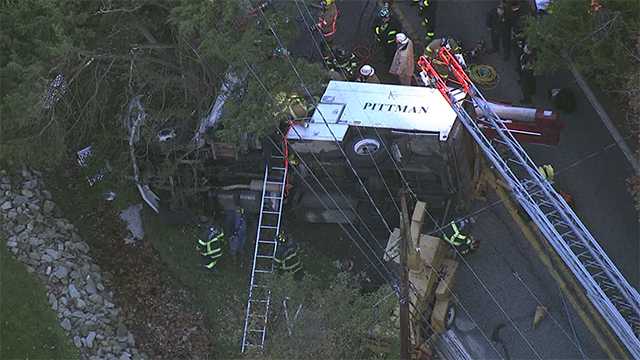 Driver dies after utility truck overturns in northern Baltimore County
