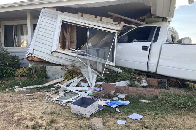 Pictures: Truck evading police slams into south Sacramento home
