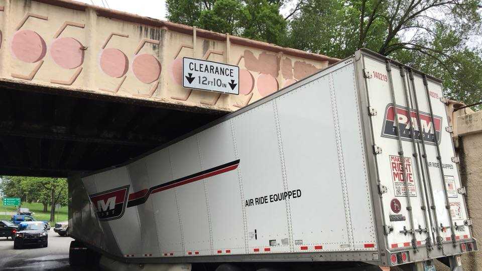 Tractortrailer gets stuck under Carlisle bridge