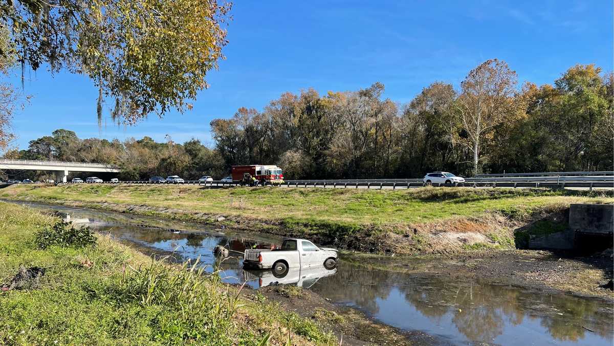 Police: 1 person taken to the hospital after truck crashes into canal ...