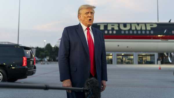 FILE - Former President Donald Trump speaks with reporters before departure from Hartsfield-Jackson Atlanta International Airport, Thursday, Aug. 24, 2023, in Atlanta.