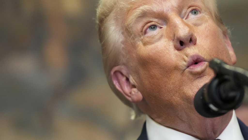 Trump signs order imposing new tariffs on a number of trading partners