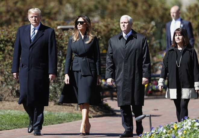 President&#x20;Donald&#x20;Trump&#x20;and&#x20;First&#x20;lady&#x20;Melania&#x20;Trump,&#x20;left,&#x20;and&#x20;Vice&#x20;President&#x20;Mike&#x20;Pence,&#x20;and&#x20;wife&#x20;Karen&#x20;Pence&#x20;arrive&#x20;ahead&#x20;of&#x20;a&#x20;funeral&#x20;service&#x20;at&#x20;the&#x20;Billy&#x20;Graham&#x20;Library&#x20;for&#x20;the&#x20;Rev.&#x20;Billy&#x20;Graham