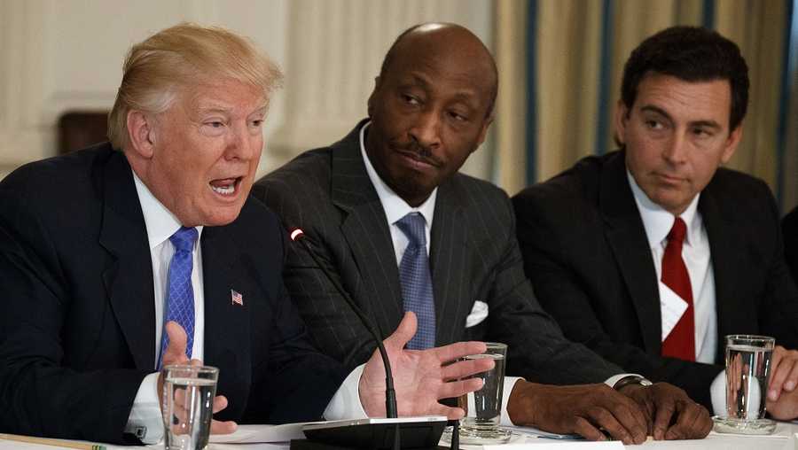 In this Thursday, Feb. 23, 2017, file photo, President Donald Trump, left, speaks during a meeting with manufacturing executives at the White House in Washington, including Merck CEO Kenneth Frazier, center, and Ford CEO Mark Fields. Frazier is resigning from the President’s American Manufacturing Council citing "a responsibility to take a stand against intolerance and extremism." Frazier's resignation comes shortly after a violent confrontation between white supremacists and protesters in Charlottesville, Va. Trump is being criticized for not explicitly condemning the white nationalists who marched in Charlottesville.