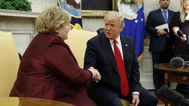 President Donald Trump meets with Norwegian Prime Minister Erna Solberg in the Oval Office of the White House, Wednesday, Jan. 10, 2018, in Washington.