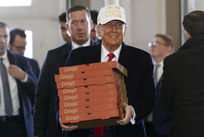 Iowa caucuses: Trump hands out Casey's pizza in Waukee