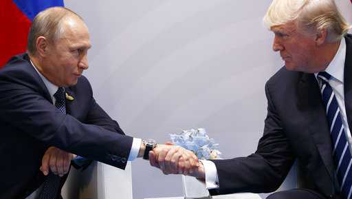 President Donald Trump shakes hands with Russian President Vladimir Putin at the G20 Summit, Friday, July 7, 2017, in Hamburg.