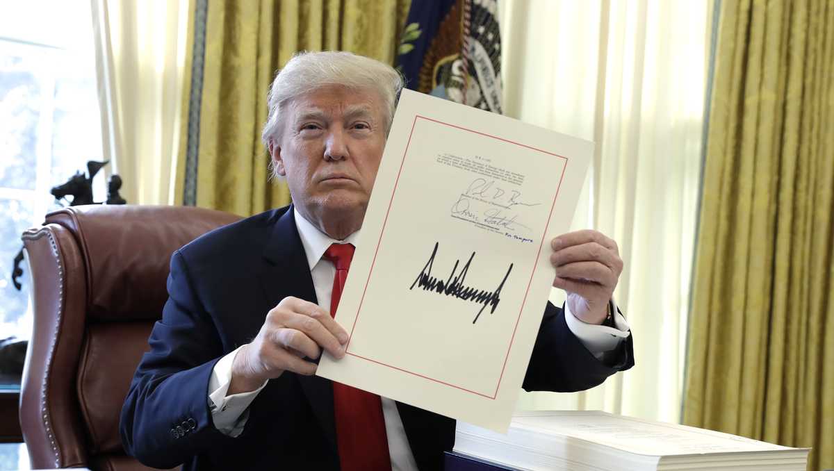 President Trump signs GOP's sweeping tax bill into law