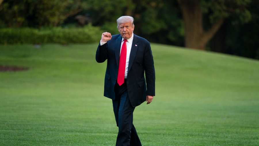 U.S. President Donald Trump walks to the White House residence after exiting Marine One on the South Lawn on June 25, 2020 in Washington, DC.