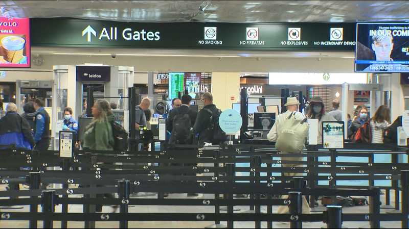 Some airport bottlenecks ease as TSA says workers got paid Monday