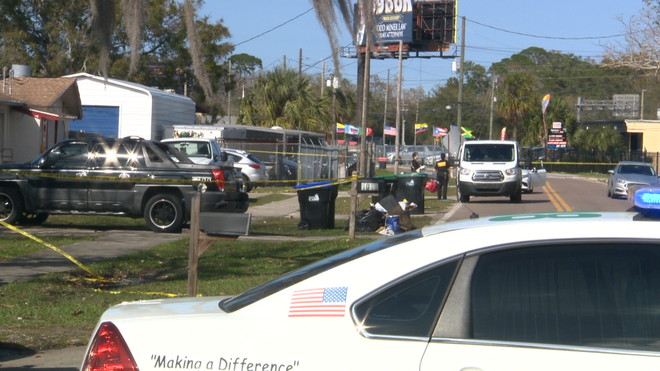 Man arrested after 2 found dead in an Orange County home