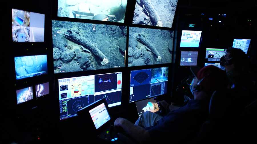 randy prickett (left) pilots mbari’s remotely operated vehicle (rov) doc ricketts while senior scientist steven haddock (right) documents the mammoth tusk before beginning the retrieval operation