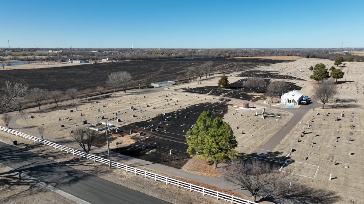 Grass fire in Tuttle challenges firefighters as winds shift