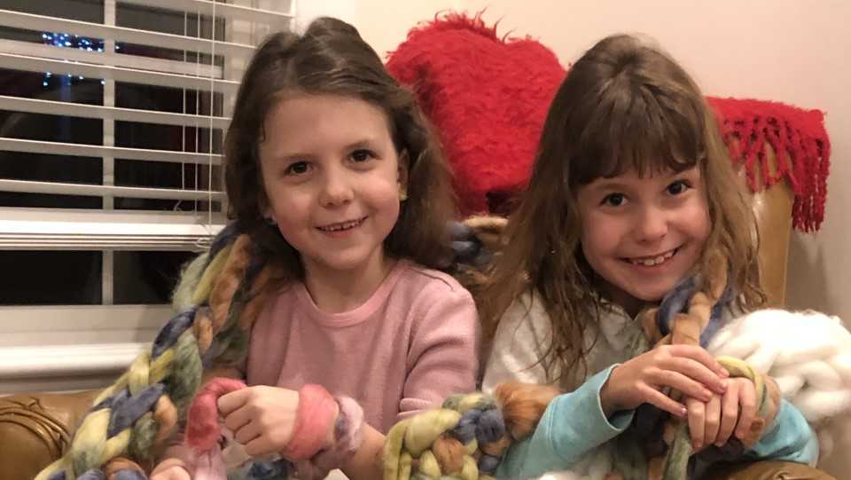 5 for Good Needham twins knit scarves for charity