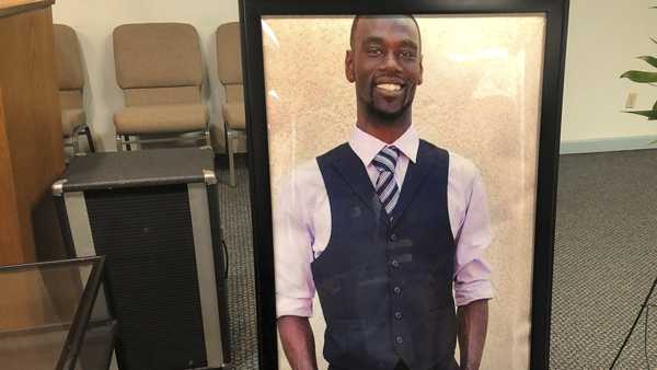 A portrait of Tyre Nichols is displayed at a memorial service for him on Tuesday, Jan. 17, 2023 in Memphis, Tenn. Nichols was killed during a traffic stop with Memphis Police on Jan. 7.  (AP Photo/Adrian Sainz)