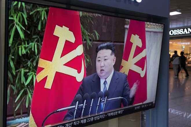 A TV screen shows a file image of North Korean leader Kim Jong Un during a news program at Seoul Railway Station in Seoul, South Korea, Thursday, May 22, 2025.