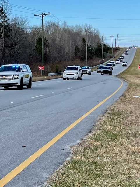 Procession&#x20;for&#x20;Union&#x20;County&#x20;Sheriff&#x27;s&#x20;Office&#x20;Sgt.&#x20;Tommy&#x20;Cudd,&#x20;who&#x20;died&#x20;Thursday&#x20;of&#x20;COVID-19-related&#x20;illnesses,&#x20;officials&#x20;say.