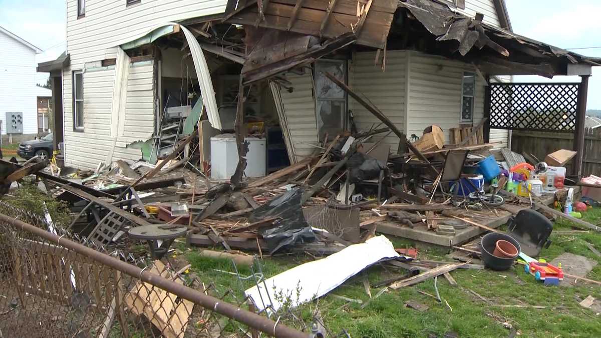 SUV crashes through Uniontown home; 1 person flown to hospital