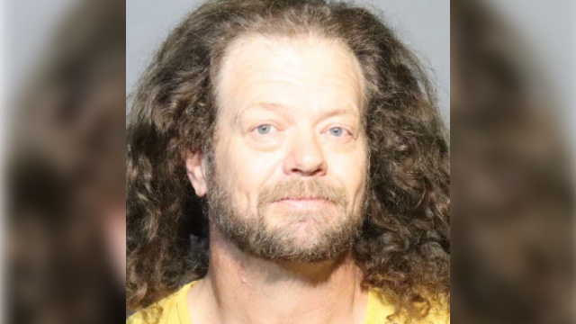 Man arrested for hitting woman with protest sign in Sanford, police say