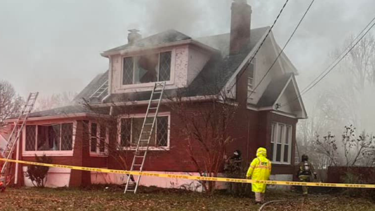 Man found dead with gunshot wound inside burning Beechmont home