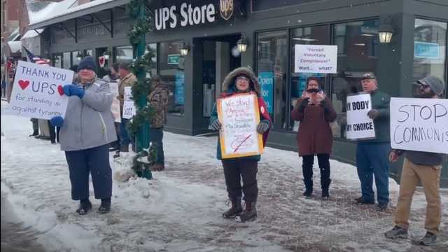 Small group of anti-mask protesters gather outside of Newport store - Vimarsana News