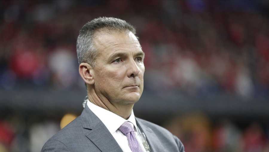 Former Ohio State head coach Urban Meyer watches during the second half of the Big Ten championship NCAA college football game between Ohio State and Wisconsin, Saturday, Dec. 7, 2019, in Indianapolis. (AP Photo/Michael Conroy)