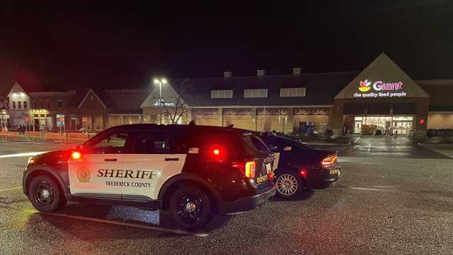 Man arrested, guns seized after fatal supermarket shooting - Vimarsana News