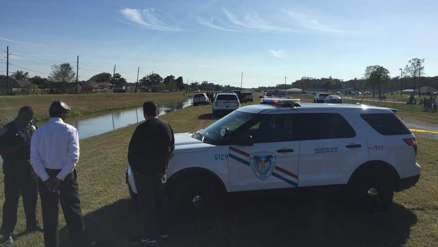 Deputies investigate a man who was found dead in a Marrero canal Sunday.
