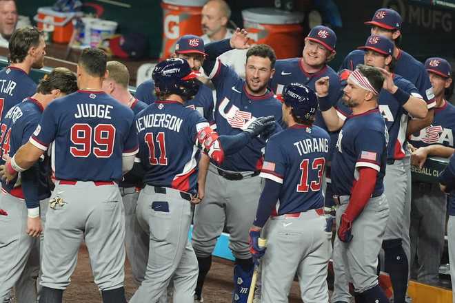 United States&amp;apos; Gunnar Henderson (11) celebrates his home run during the fourth inning of a World Baseball Classic semifinal game against the Dominican Republic, Sunday, March 15, 2026, in Miami.