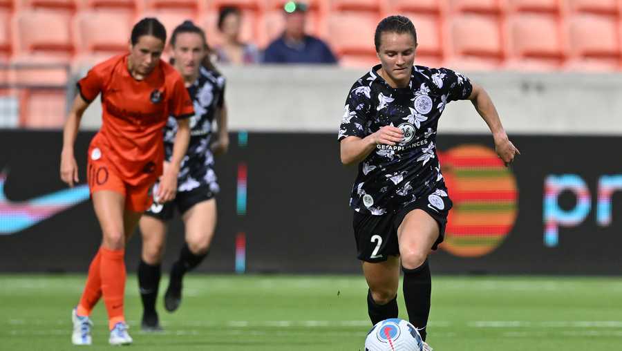 Apr 24, 2022; Houston, TX, USA; Racing Louisville FC midfielder Lauren Milliet (2) brings the ball upfield against the Houston Dash during the first half at PNC Stadium. Mandatory Credit: Maria Lysaker-USA TODAY Sports