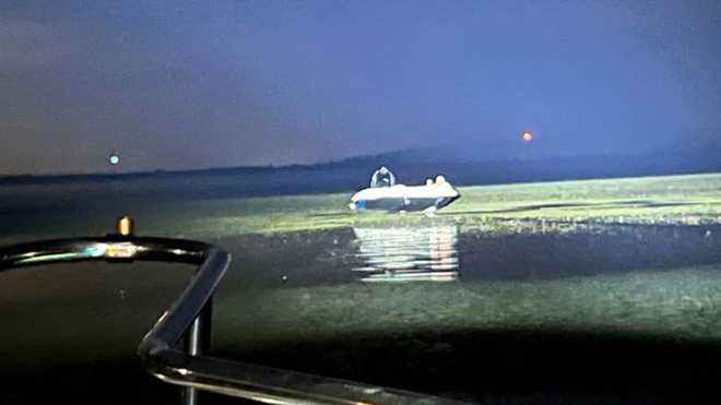 Family rescued from boat during storms