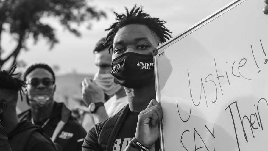 USM football players protest against racial injustice