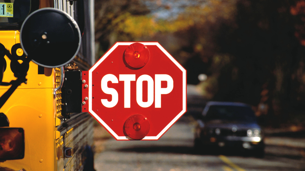 North Carolina police officer cited for passing stopped school bus ...