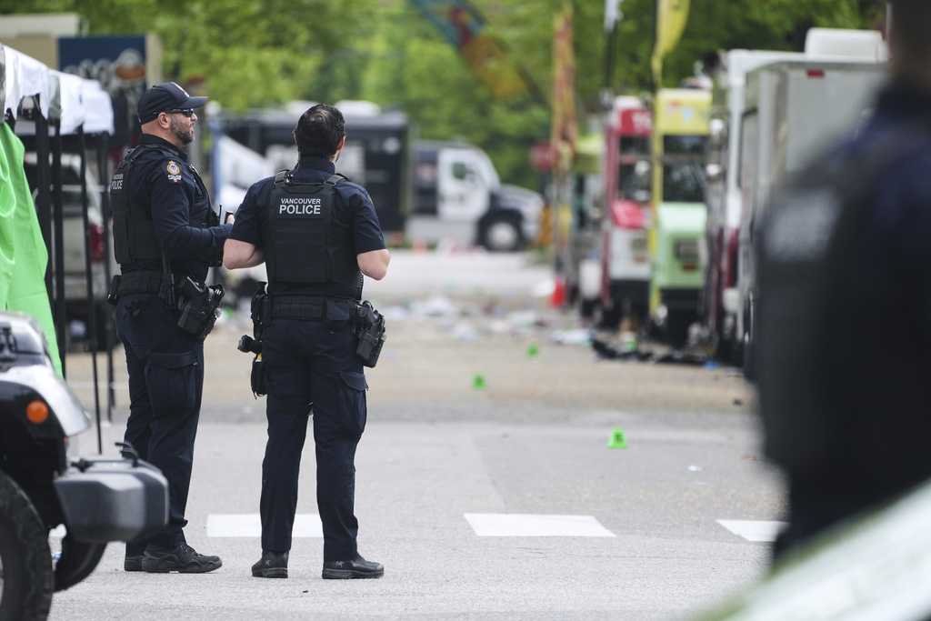 Murder charges filed against suspect in ramming attack on Vancouver street festival that killed 11