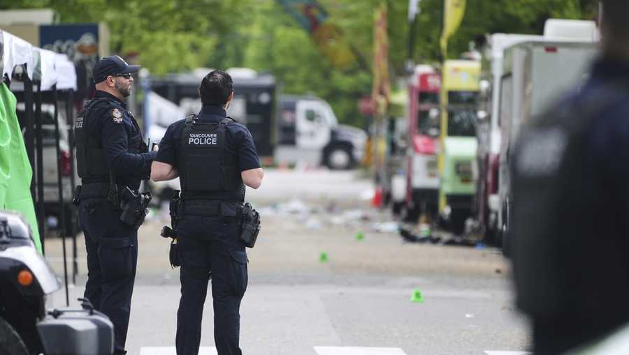 Vancouver Police survey the scene after a driver killed multiple people Saturday during a Filipino community festival Sunday, April 27, 2025, in Vancouver, British Columbia.