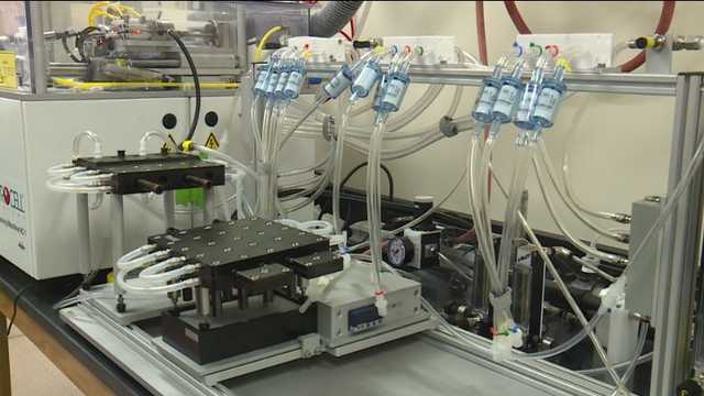 automated vape testing machine, robot vaping test, scientific vape puff measurement equipment - Kansas City doctor uses