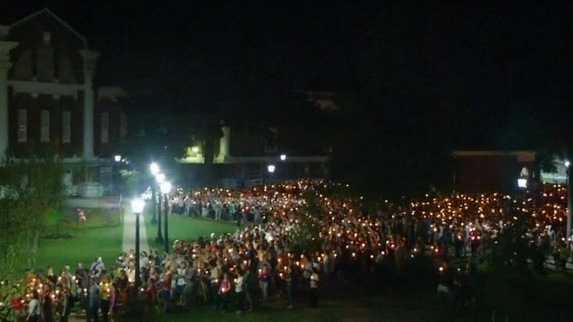 Peaceful candlelight vigil moves through UVA campus