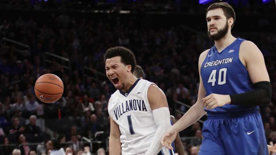 Villanova's Jalen Brunson (1) celebrates after scoring as Creighton's Zach Hanson (40) reacts during the first half of a championship NCAA college basketball game in the finals of the Big East men's tournament Saturday, March 11, 2017, in New York.